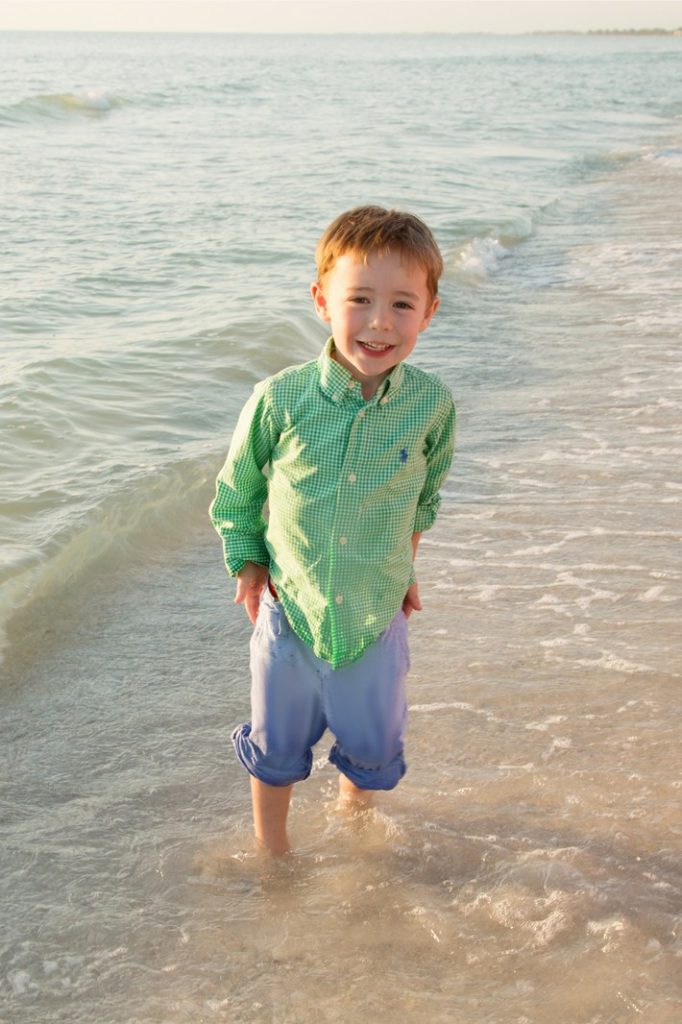 Candid Portrait of a Little Boy on the Beach