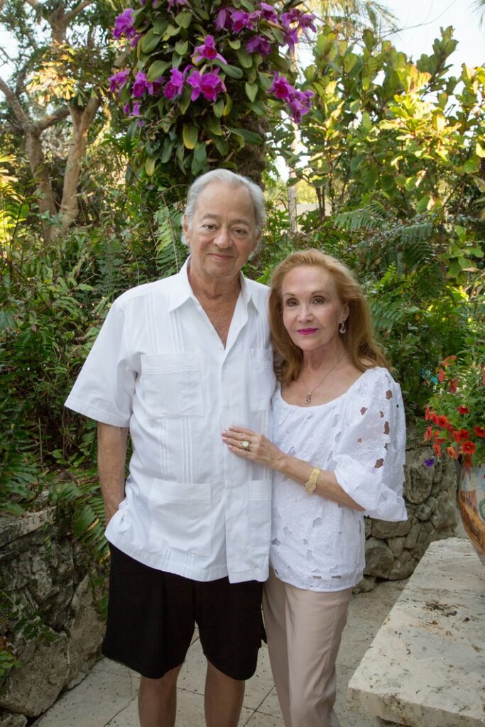 outdoor portrait of a mature couple wearing white shirts