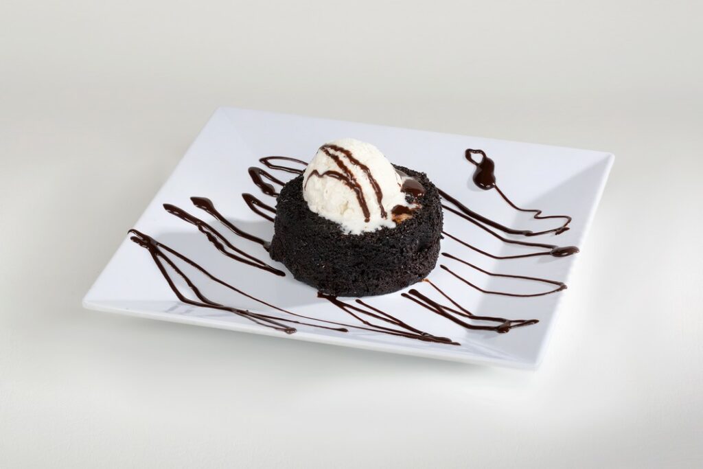 food photography - chocolate lava cake with a scoop of vanilla ice cream